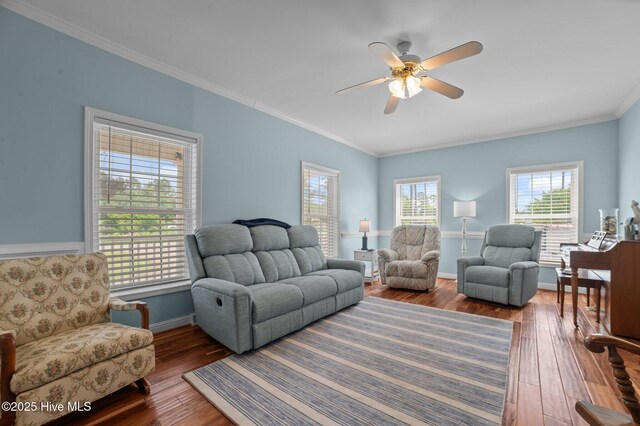 859 Old Pamlico Beach Rd W, Belhaven, NC 27810 - living room with a ceiling fan, hardwood / wood-style flooring, ornamental molding, and baseboards