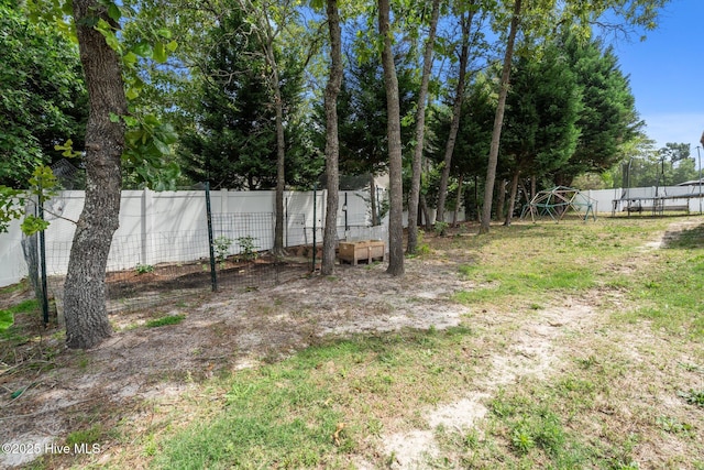 144 Newington Way, Aberdeen, NC 28315 - fenced backyard featuring a trampoline