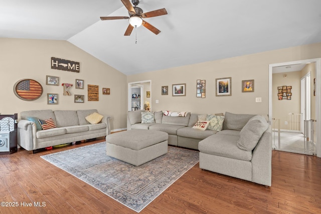 144 Newington Way, Aberdeen, NC 28315 - living area featuring ceiling fan, vaulted ceiling, wood finished floors, and baseboards