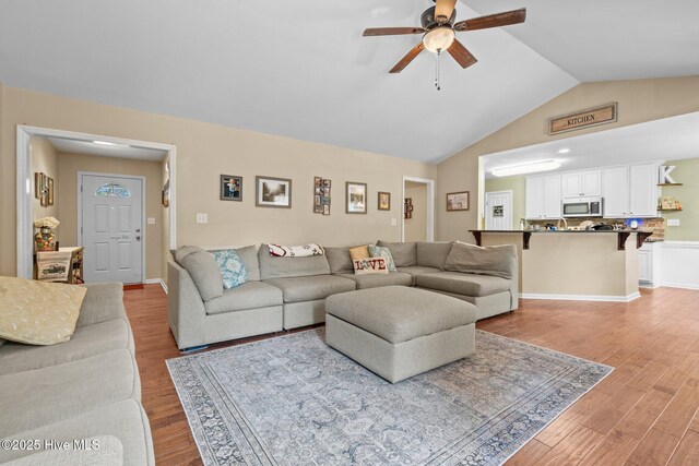 144 Newington Way, Aberdeen, NC 28315 - living area with a ceiling fan, light wood finished floors, and lofted ceiling