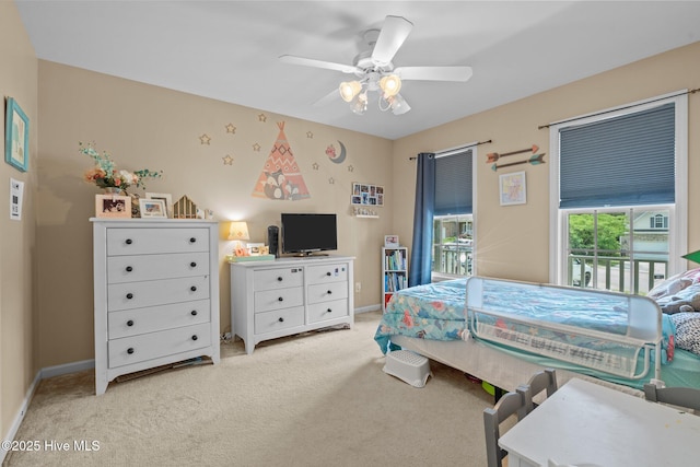 144 Newington Way, Aberdeen, NC 28315 - carpeted bedroom with baseboards, ceiling fan, and access to exterior