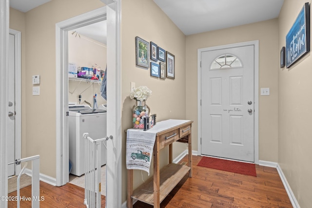 144 Newington Way, Aberdeen, NC 28315 - entryway with wood finished floors, washer and clothes dryer, and baseboards