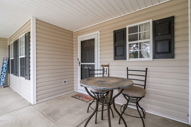 144 Newington Way, Aberdeen, NC 28315 - porch featuring outdoor dining area