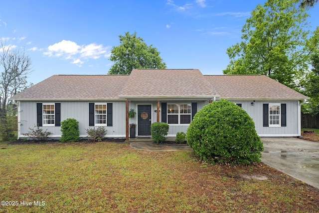 303 Foxtrace Ln, Hubert, NC 28539 - single story home featuring a front yard and roof with shingles