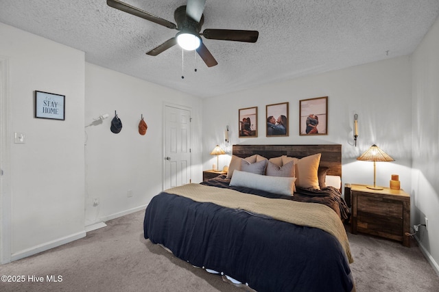 303 Foxtrace Ln, Hubert, NC 28539 - carpeted bedroom with a textured ceiling, baseboards, and a ceiling fan