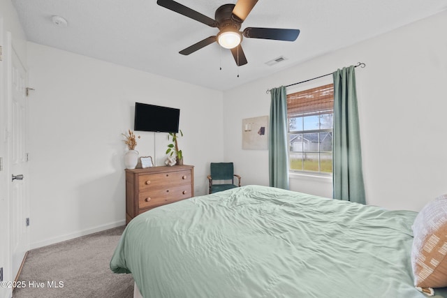 303 Foxtrace Ln, Hubert, NC 28539 - bedroom with carpet, baseboards, and ceiling fan