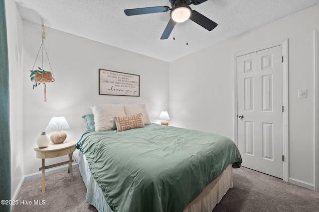303 Foxtrace Ln, Hubert, NC 28539 - bedroom featuring carpet, a textured ceiling, baseboards, and a ceiling fan