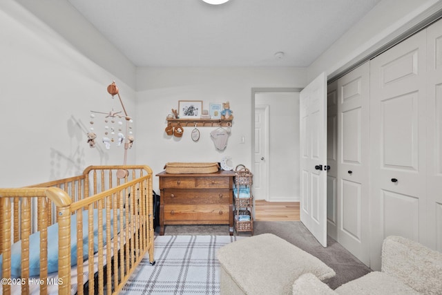 303 Foxtrace Ln, Hubert, NC 28539 - bedroom featuring a closet and a nursery area