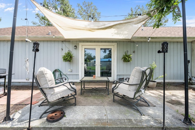 303 Foxtrace Ln, Hubert, NC 28539 - view of patio / terrace featuring french doors