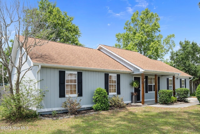 303 Foxtrace Ln, Hubert, NC 28539 - single story home featuring a front lawn and roof with shingles