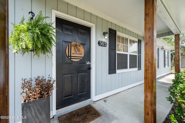 303 Foxtrace Ln, Hubert, NC 28539 - property entrance featuring a porch