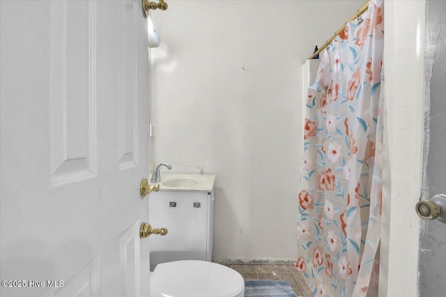 4407 E Oak Island Dr, Oak Island, NC 28465 - full bathroom with toilet, a shower with curtain, and vanity