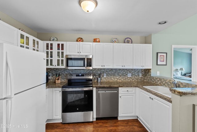 4115 Breezewood Dr Apt 202, Wilmington, NC 28412 - kitchen with appliances with stainless steel finishes, a sink, glass insert cabinets, and white cabinets