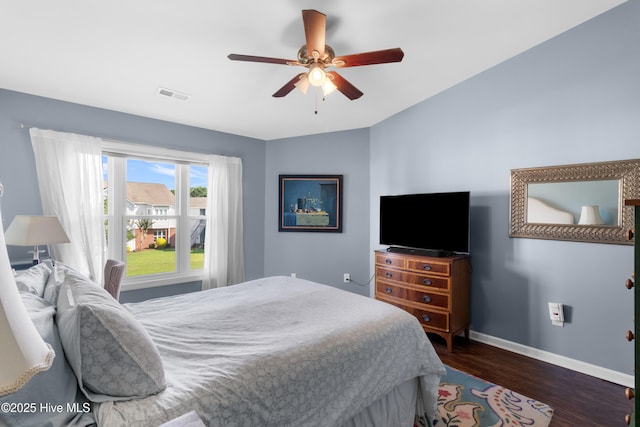 4115 Breezewood Dr Apt 202, Wilmington, NC 28412 - bedroom featuring baseboards, wood finished floors, and a ceiling fan