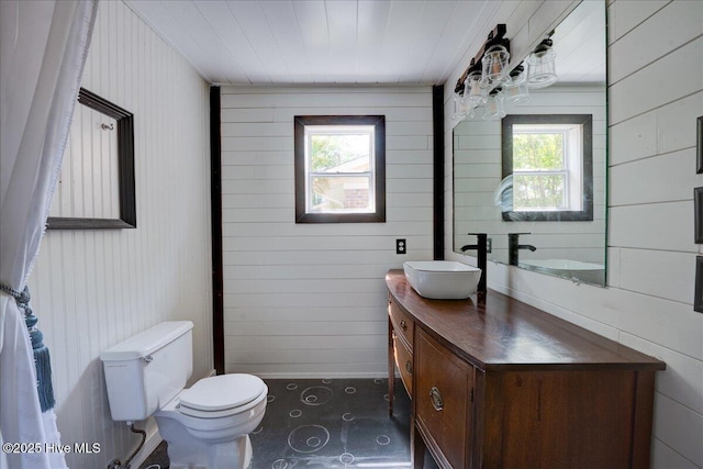 1721 Spencer Ave, New Bern, NC 28560 - full bath with toilet, wooden walls, and vanity