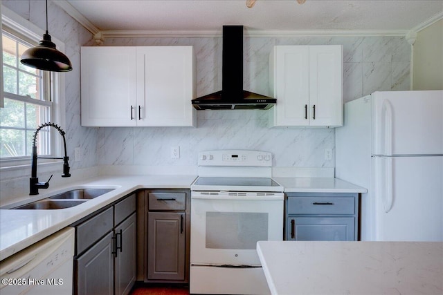 1721 Spencer Ave, New Bern, NC 28560 - kitchen featuring white appliances, wall chimney range hood, a sink, ornamental molding, and light countertops