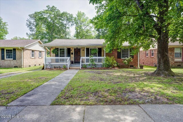 1721 Spencer Ave, New Bern, NC 28560 - ranch-style house featuring a porch, crawl space, brick siding, and a front yard