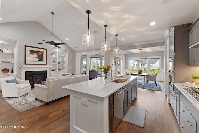 4224 Cobleskill Dr, Leland, NC 28451 - kitchen with a sink, ceiling fan, appliances with stainless steel finishes, dark wood-type flooring, and recessed lighting
