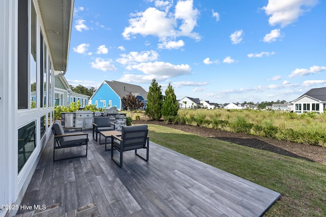 4224 Cobleskill Dr, Leland, NC 28451 - deck featuring area for grilling, a residential view, and a lawn