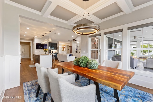 4224 Cobleskill Dr, Leland, NC 28451 - dining space with a chandelier, ornamental molding, wood finished floors, and coffered ceiling