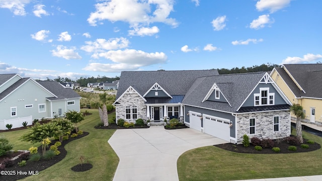 4224 Cobleskill Dr, Leland, NC 28451 - craftsman inspired home with stone siding, a standing seam roof, driveway, a front yard, and metal roof