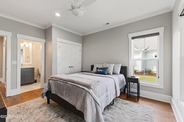 4224 Cobleskill Dr, Leland, NC 28451 - bedroom with light wood-style floors, ornamental molding, recessed lighting, a closet, and baseboards