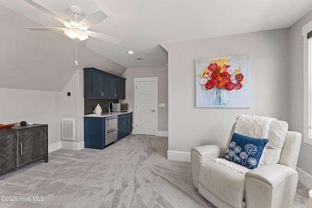 4224 Cobleskill Dr, Leland, NC 28451 - sitting room with baseboards, light colored carpet, a ceiling fan, lofted ceiling, and recessed lighting