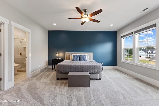 4224 Cobleskill Dr, Leland, NC 28451 - carpeted bedroom with baseboards, recessed lighting, connected bathroom, and ceiling fan
