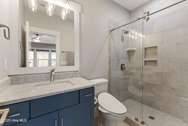 4224 Cobleskill Dr, Leland, NC 28451 - full bathroom featuring vanity, a stall shower, toilet, and a ceiling fan