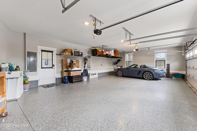 4224 Cobleskill Dr, Leland, NC 28451 - garage featuring electric panel and a garage door opener