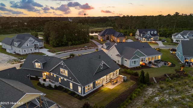4224 Cobleskill Dr, Leland, NC 28451 - aerial perspective of suburban area featuring a heavily wooded area