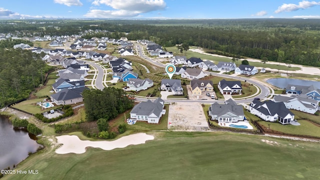 4224 Cobleskill Dr, Leland, NC 28451 - aerial view of property and surrounding area with a heavily wooded area and nearby suburban area