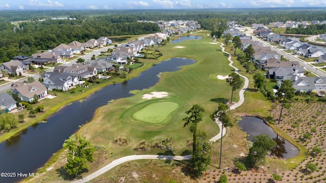 4224 Cobleskill Dr, Leland, NC 28451 - aerial view of property and surrounding area featuring nearby suburban area, a local golf course, and a large body of water