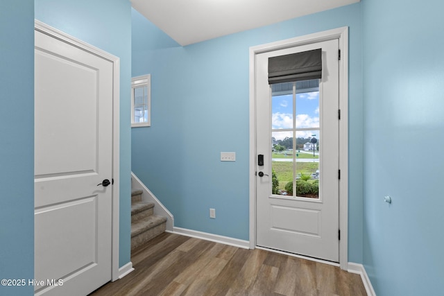 84 Capital Dr, Hampstead, NC 28443 - entryway featuring wood finished floors, baseboards, and stairs