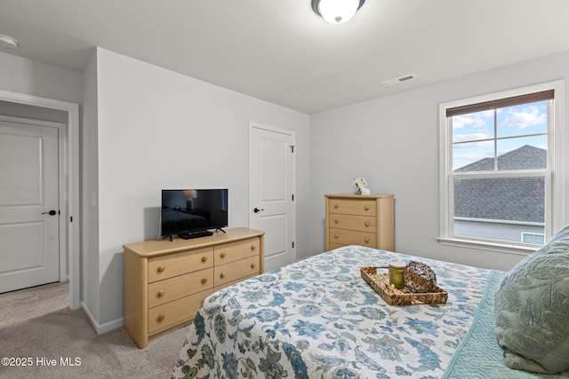 84 Capital Dr, Hampstead, NC 28443 - bedroom with light colored carpet and baseboards