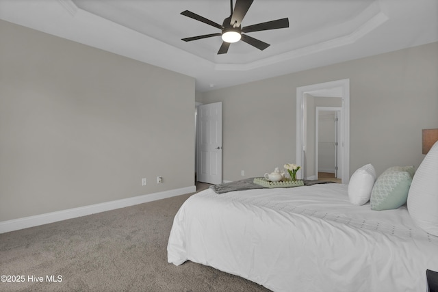 1306 Wakefield Ct, Winnabow, NC 28479 - bedroom featuring a raised ceiling, carpet, baseboards, and ceiling fan