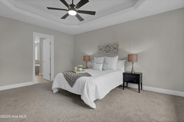1306 Wakefield Ct, Winnabow, NC 28479 - bedroom with a raised ceiling, carpet, baseboards, and connected bathroom