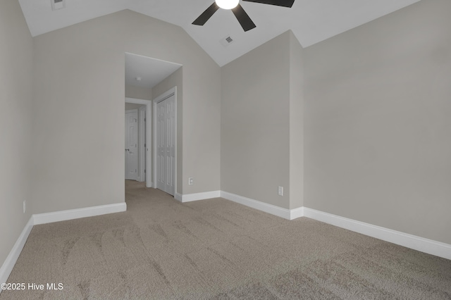 1306 Wakefield Ct, Winnabow, NC 28479 - spare room with carpet floors, ceiling fan, lofted ceiling, and baseboards