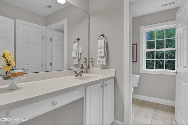 1306 Wakefield Ct, Winnabow, NC 28479 - bathroom featuring vanity, baseboards, toilet, and tile patterned floors