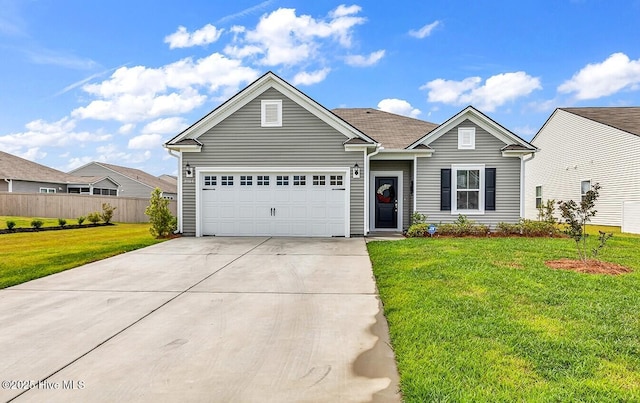 view of front of property featuring driveway and a garage