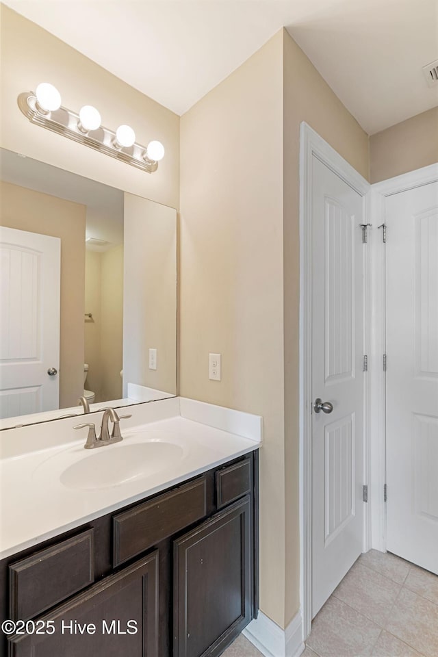 113 Kingsmill Dr, Pikeville, NC 27863 - bathroom with vanity and tile patterned floors