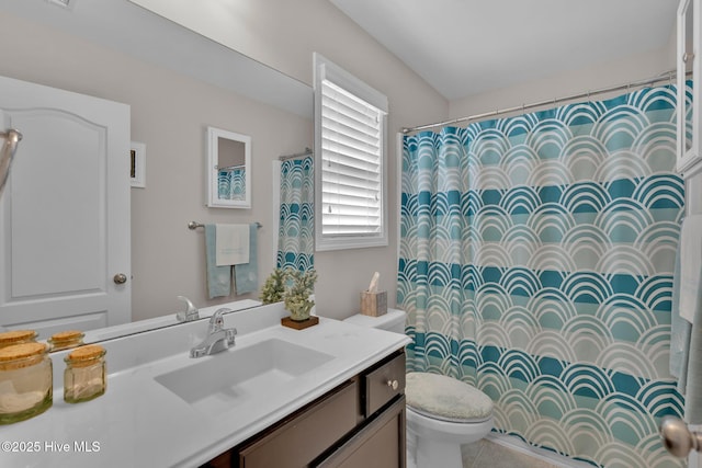 2017 Willow Stone Ct, Leland, NC 28451 - bathroom featuring toilet, vanity, and a shower with shower curtain
