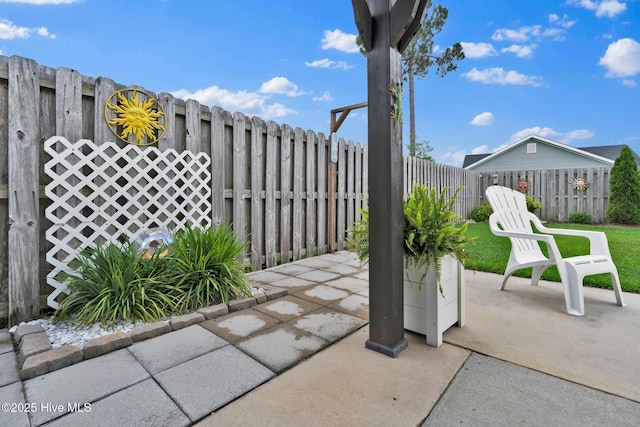 2017 Willow Stone Ct, Leland, NC 28451 - fenced backyard with a patio area