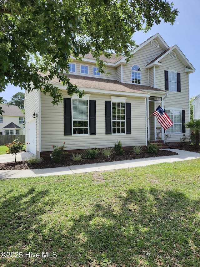 5024 Gate Post Ln, Wilmington, NC 28412 - view of front of house with a garage and a front lawn