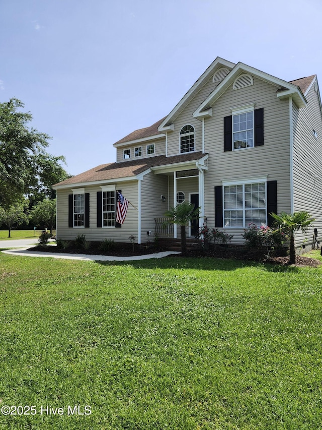 5024 Gate Post Ln, Wilmington, NC 28412 - view of front of property with a front yard and a porch