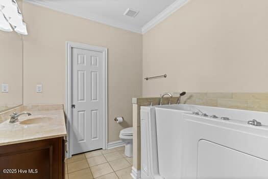 375 Summit Farms Trl, Moyock, NC 27958 - bathroom with ornamental molding, tile patterned floors, vanity, and toilet