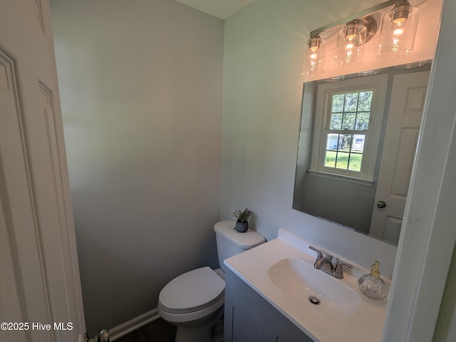 2527 Country Club Rd, Jacksonville, NC 28546 - half bathroom featuring toilet and vanity