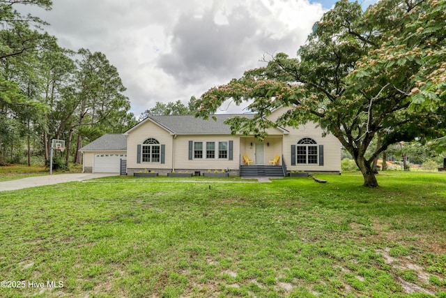 60 Pine Lake Rd, Southport, NC 28461 - view of front of home featuring a garage, a front yard, and driveway