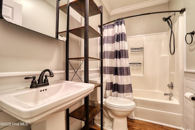 60 Pine Lake Rd, Southport, NC 28461 - full bath featuring shower / bath combo, wood finished floors, ornamental molding, toilet, and a sink