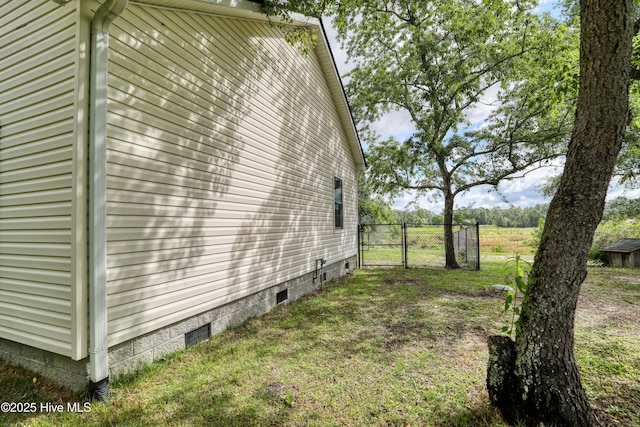 60 Pine Lake Rd, Southport, NC 28461 - view of home's exterior featuring a gate and crawl space